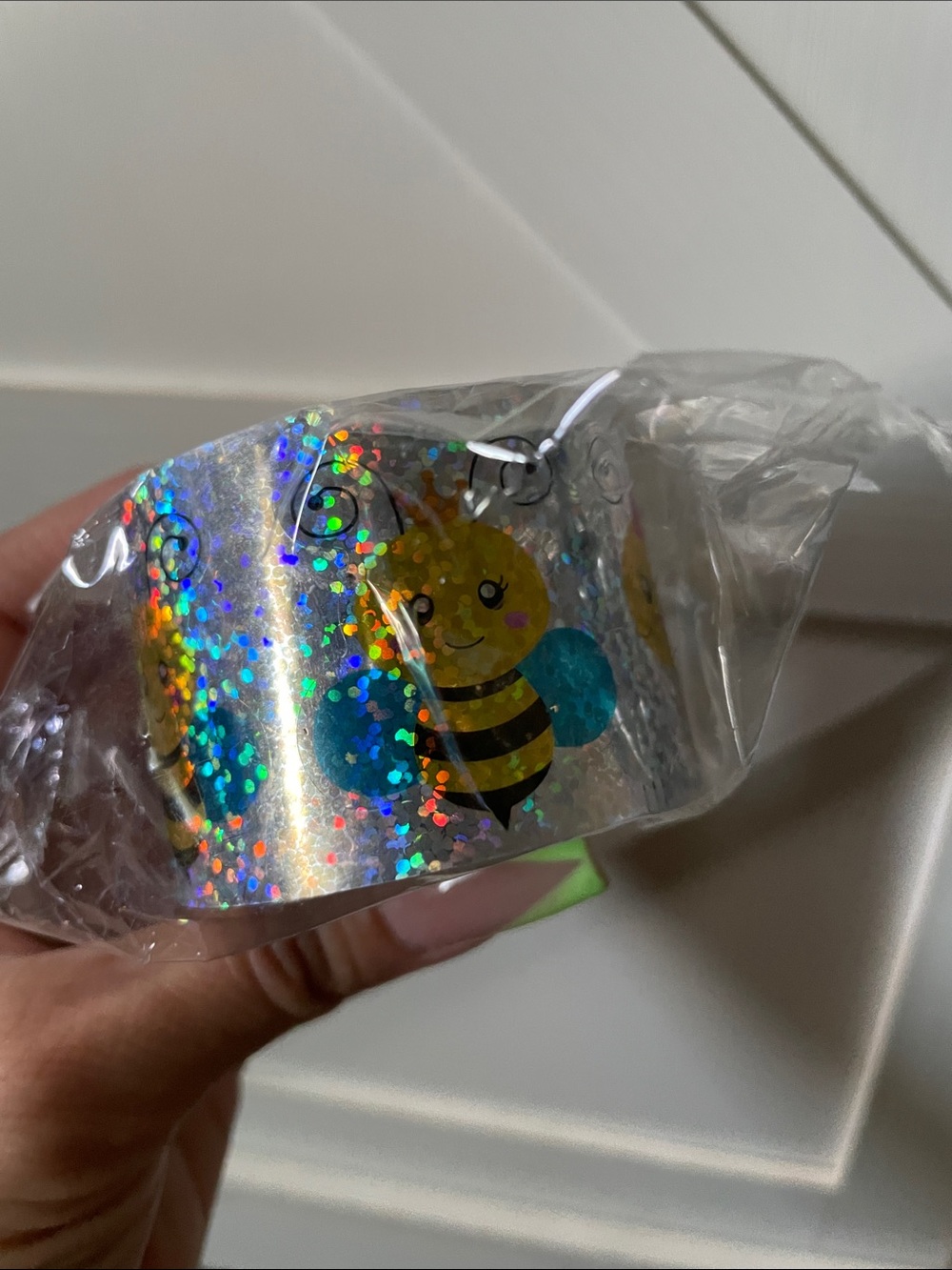 Holographic Bee Sticker Roll - Silver with Yellow & Teal Bees